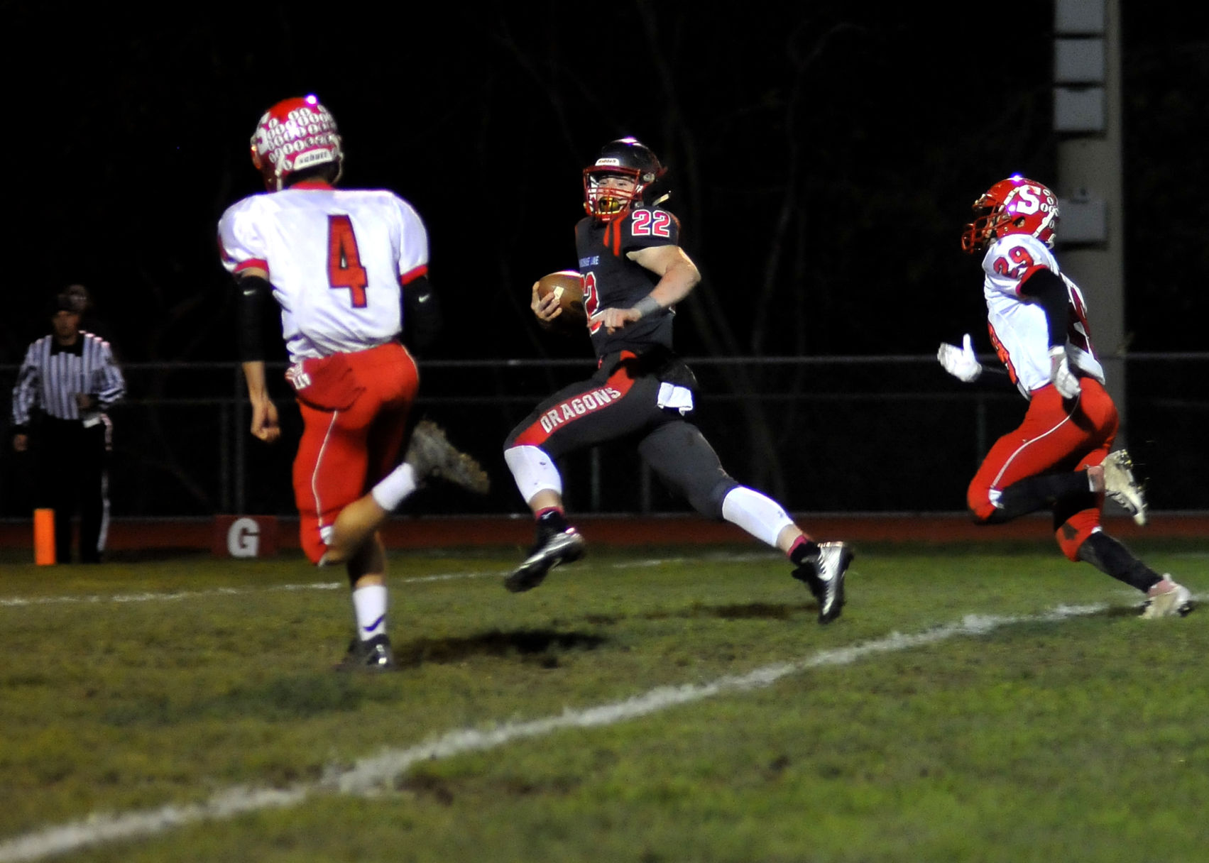 Dragons Scorch Trojans 56-22